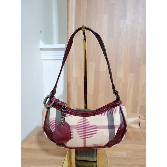 Burberry Handbags - Burberry Rare London Heart Pochette
